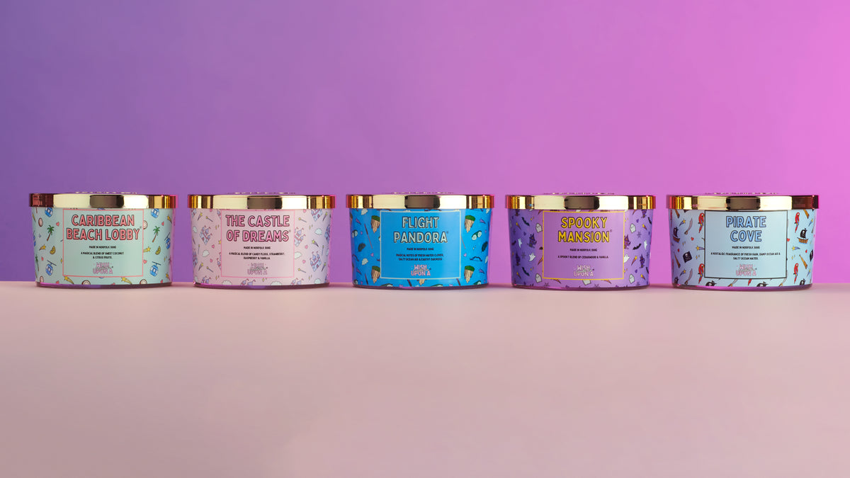 Luxury theme park inspired candle collection with premium home fragrance products