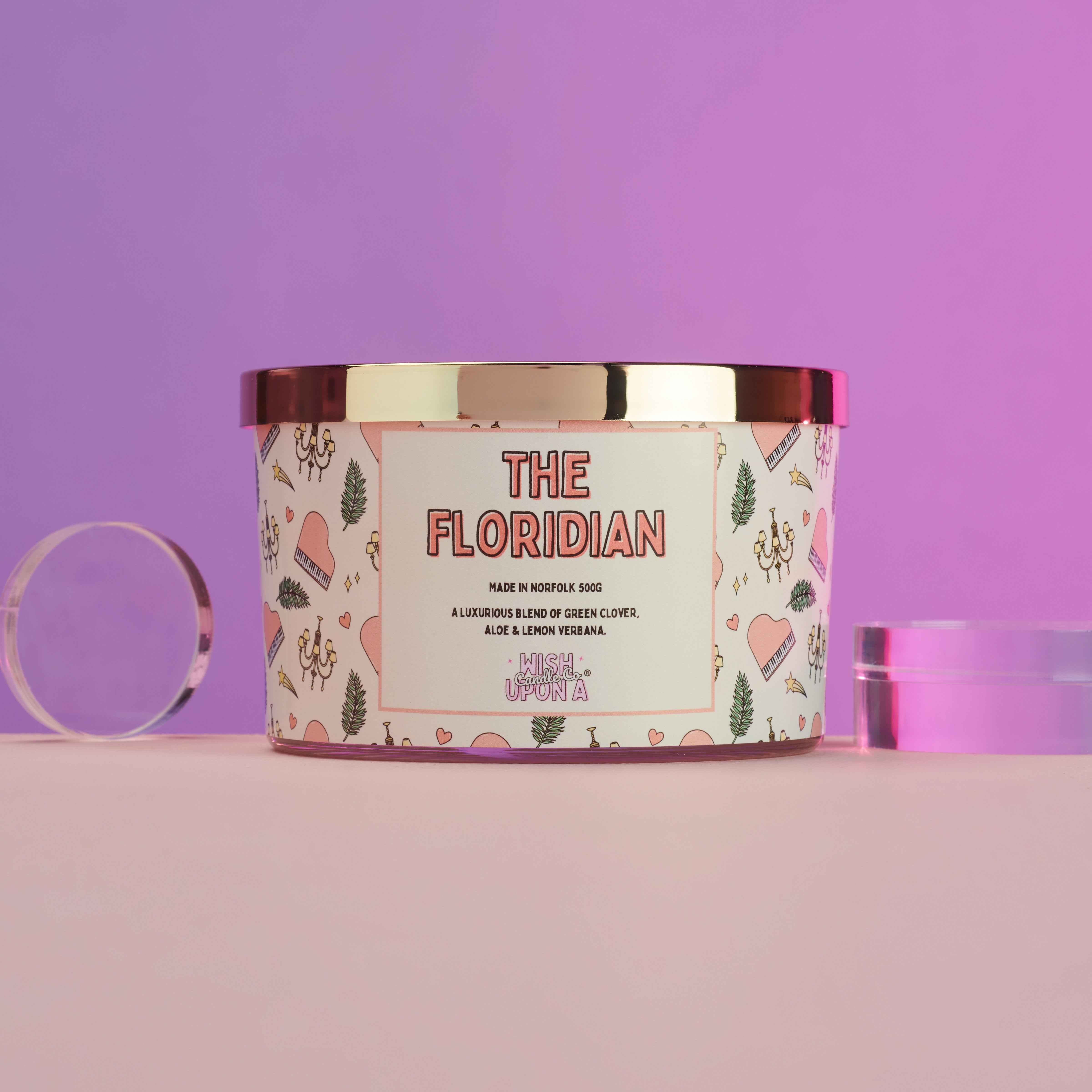 The Floridian triple wick candle with fresh aloe citrus and green clover resort inspired fragrance