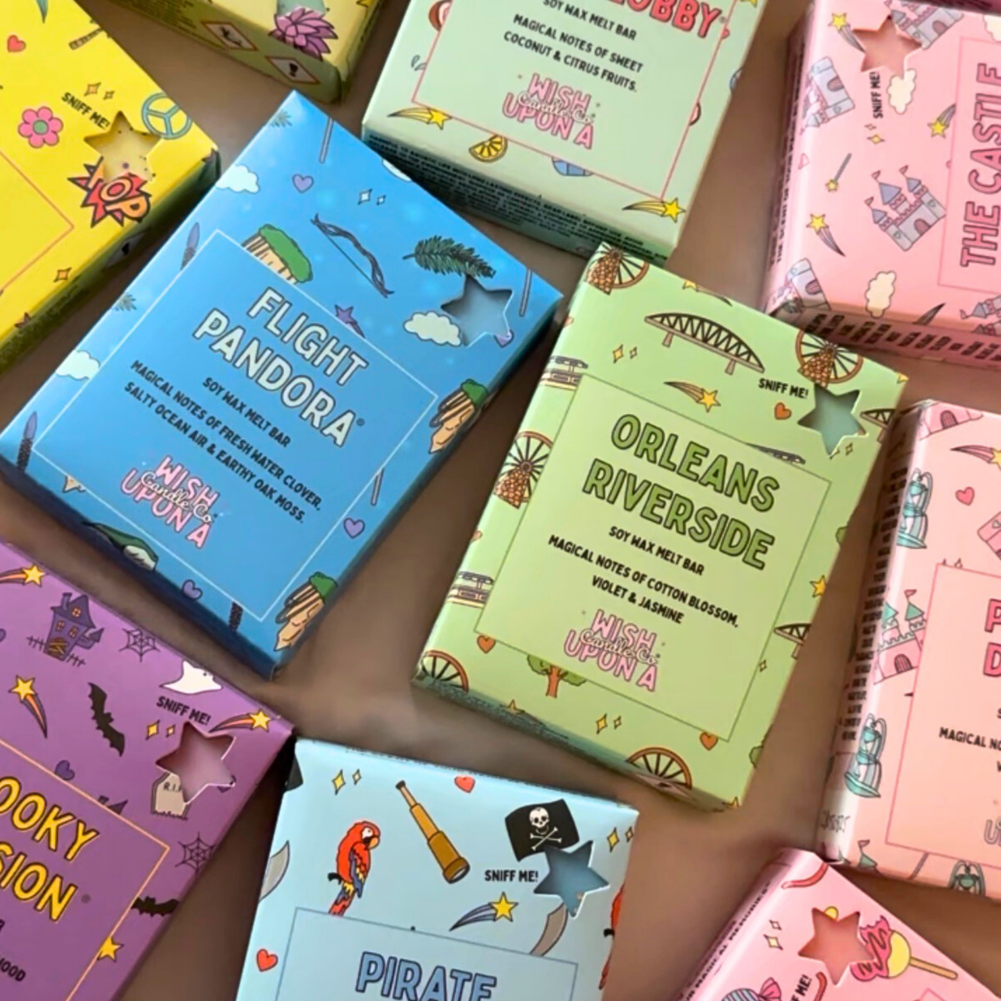 Theme park inspired wax melt bar collection with a variety of luxury fragrance blends